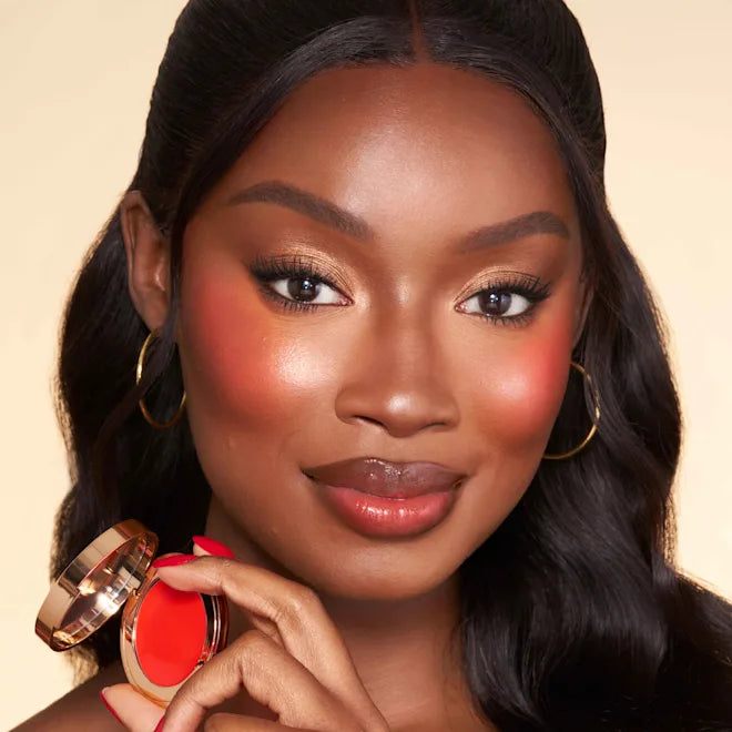 charlotte tilbury beautiful skin island glow lip and cheek pinched cheek
